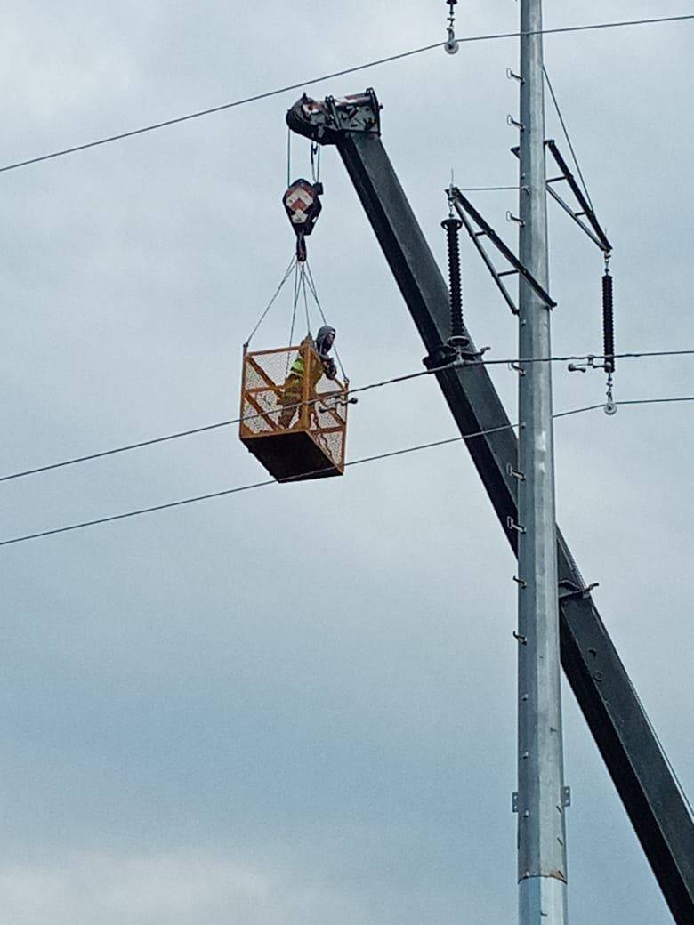 Site team coordinating electrical installation