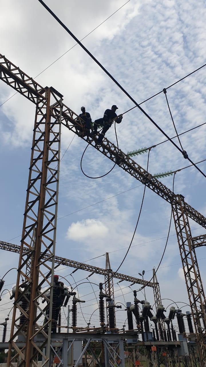 Insulator hardware on a switchyard gantry